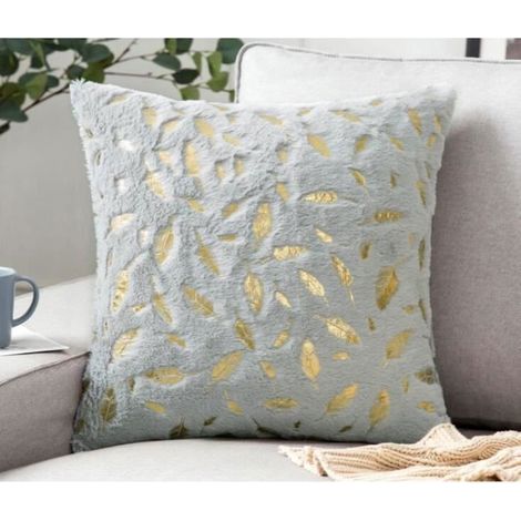 A plush velvet cushion cover with soft faux fur and gold stamping.