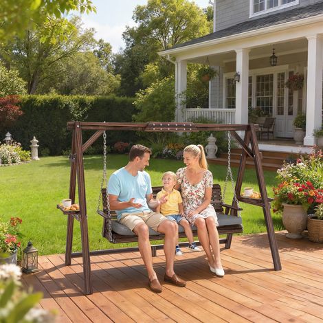 Balançoire Hollywood. Balançoire de jardin en bois 3 places. Balançoire en bois avec coussin d'assise et étagères de rangement, supportant jusqu'à 330 kg. Finition carbonisée.