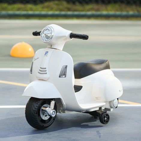 Moto eléctrica infantil (66.5x38x52 cm), con pedal, faro y claxon, plástico blanco (1/5)
