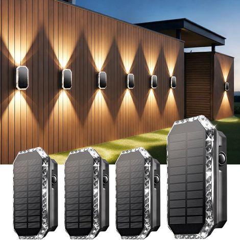 JSSEVN - Aplique solar de pared, 4 apliques solares de pared para exteriores (hacia arriba y hacia abajo), aplique solar de pared con 3 modos, aplique solar impermeable IP65 para jardín, valla y patio (1/5)