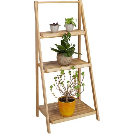 Estante para plantas de bambu en interiores