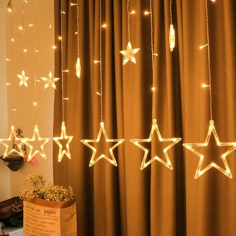 Les rideaux en forme d'étoiles fluo peuvent être installés à l'extérieur, et la couronne de Noël est imperméable. Les étoiles sont... (1/4)
