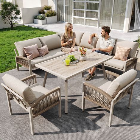 Canapé de jardin forme L pour 8 personnes : cadre fer, coussins beiges, 1 table verre effet bois + 2 fauteuils tressés main, résistant