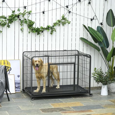 Cage de transport pliable pour chien avec double porte et serrure. Cage à quatre roues avec freins et fond amovible. 125 x 76 x 81 cm. Gris foncé.