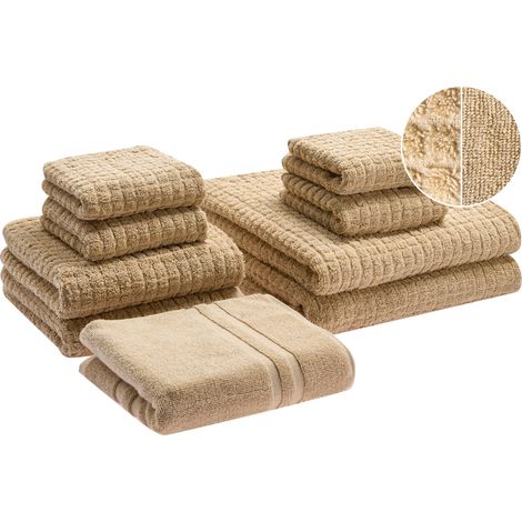 Conjunto de 9 toallas de baño de algodón suave de torsión baja con alfombrilla de baño beige arena Atai (1/5)