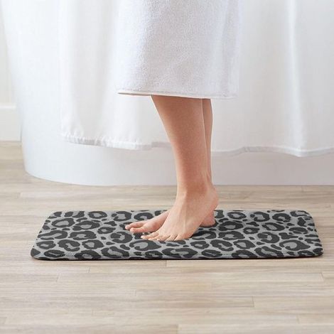 Tapis de bain zèbre antidérapant, lavable et doux, idéal pour la salle de bain, la baignoire et la décoration des sols. Dimensions : 50 x 80 cm, noir et blanc alternés. (1/5)