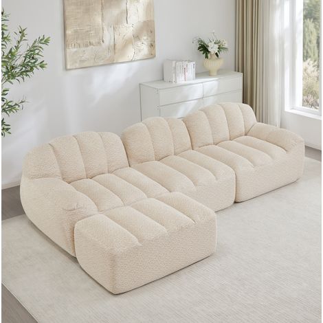 Divano modulare angolare a L 3 posti con ottomana, schiuma 32D e tessuto beige (1/5)