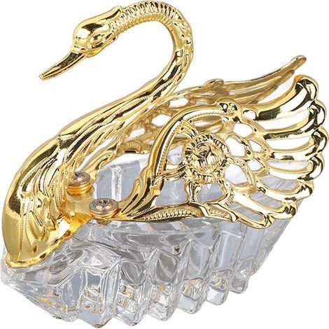 Ce pot à sucre en forme de cygne, finement ouvragé et orné de détails dorés, est une petite pièce décorative délicate de style européen qui attire le regard.