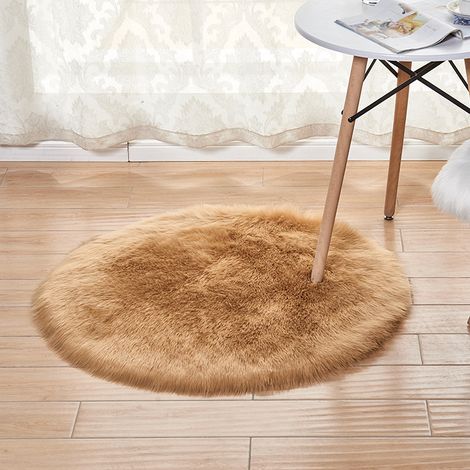 Tapis rond en peluche de couleur unie