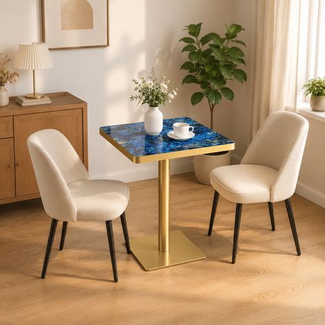 Table de salle à manger carrée avec plateau résistant aux UV, finition effet marbre et structure métallique moderne. (1/5)
