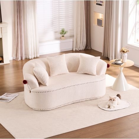 MODFU – Divano 2 posti in velluto a coste 104 cm con design cappello da clown e pompon rossi, dettagli a corno e borchie decorative – Bianco (1/5)