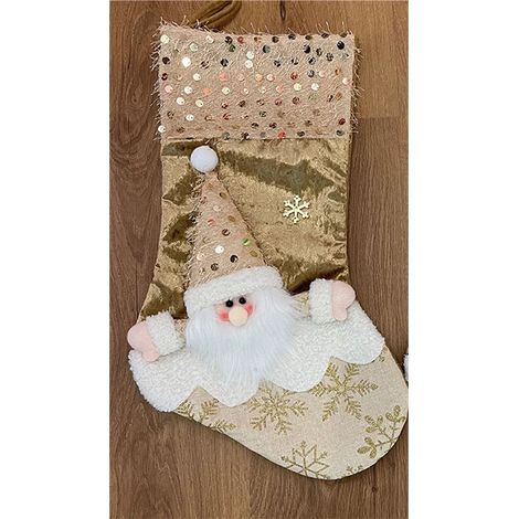 Un paquet contient quatre séries de bas de Noël, des décorations, des sacs cadeaux, des accessoires de Noël et des décorations pour sapin de Noël. (1/5)