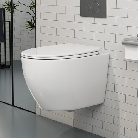 Hänge WC Kompakte Toilette aus Keramik mit Toilettendeckel mit Absenkautomatik - Toilettenschüssel mit Einloch-Superspin-Spülung - WC Weiß mit Nano Beschichtung für Gäste wc