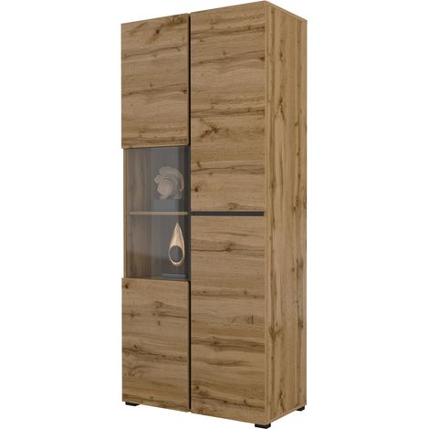 Hoher Vitrinenschrank mit 2 Türen aus der HAVANA Kollektion mit integrierter LED. Farbe Eiche und Schwarz.
