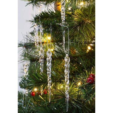 Seis adornos navideños con forma de carámbano para colgar en el árbol. Adornos retorcidos hechos a mano para crear un ambiente invernal mágico.