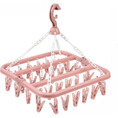 1 étendoir à linge rose avec 32 pinces à linge et cintre pliable pour chaussettes sous vêtements et vêtements d enfants solution compacte pour séchage à la maison (1/5)