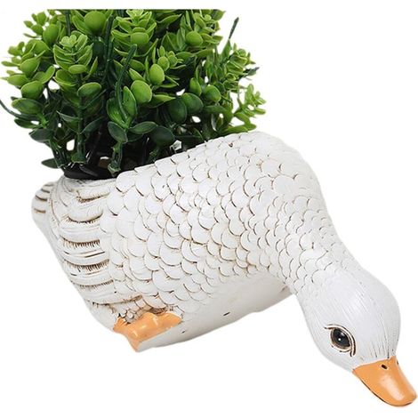 Décorations de pots de fleurs créatives sur le thème des animaux  utilisez des pots de fleurs réalistes en forme d’animaux dans votre jardin extérieur.