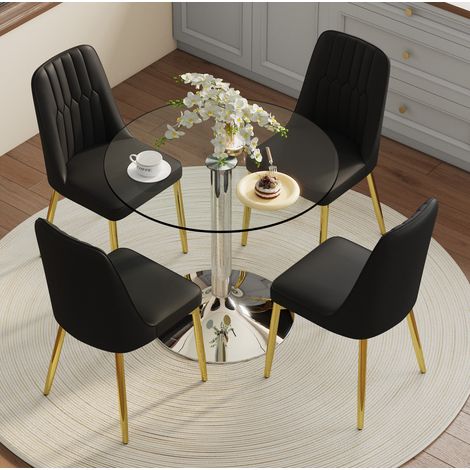 Set tavolo da pranzo rotondo in vetro 85 cm e 4 sedie in PU nere, base dorata (1/5)