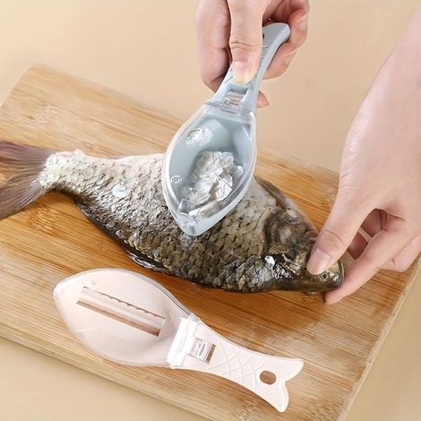 Écailleur en forme de poisson volant, équipé d'un couvercle de protection pour une utilisation pratique.