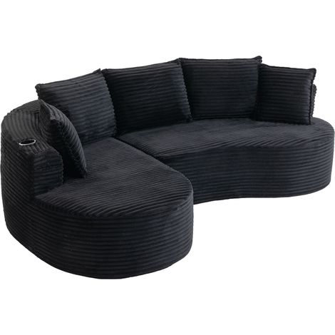 Divano curvo in corduroy nero con portabicchieri, tasche laterali e cuscino (1/5)