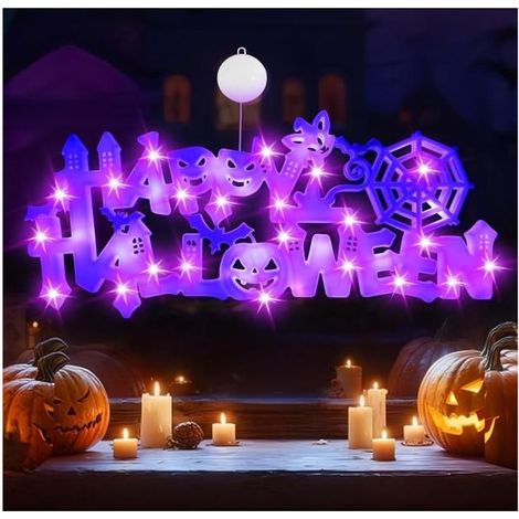 Décorations d'Halloween pour fenêtres intérieures : lumières orange citrouille, maison hantée verte, chapeau violet. (1/5)