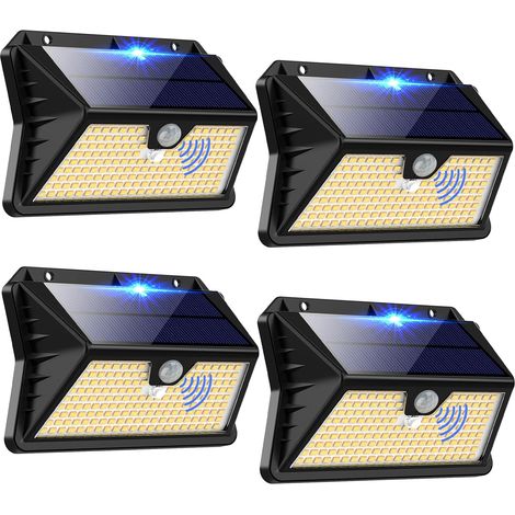 Lampe Solaire Exterieur, [4 Pack] 3 Modes Projecteur Eclairage Avec Detecteur, 185 LED Spot Solaire IP65 Etanche Lumiere Solaire pour Jardin, Garage, Patio(Blanc Chaud) (1/5)