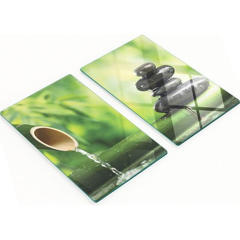 Juego de dos tablas de cocina de cristal con forma de fuente de bamb煤 de 2x30x52 cm.