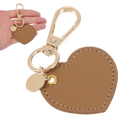 Portachiavi a forma di cuore in ecopelle con elegante ciondolo in metallo, decorazione da appendere a borsa o zaino, accessorio di moda versatile. (1/5)