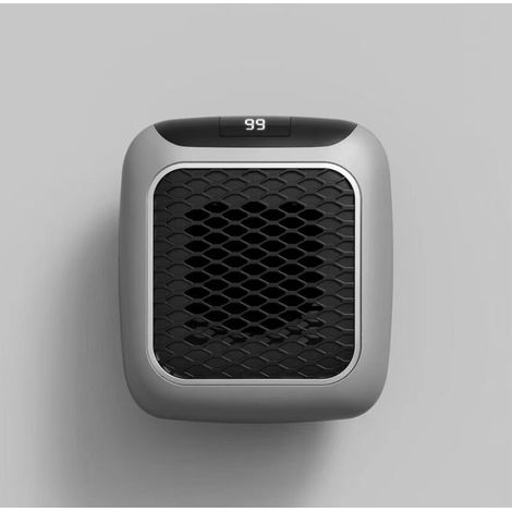Chauffage avec thermostat réglable et télécommande, adapté au salon et au bureau. (1/4)