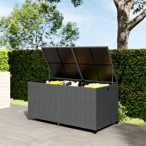 Coffre de rangement en rotin 650 L, résistant aux intempéries et aux UV, avec couvercle rembourré et roulettes. Dimensions : 150 x 75 x 74 cm. Couleur : gris foncé.