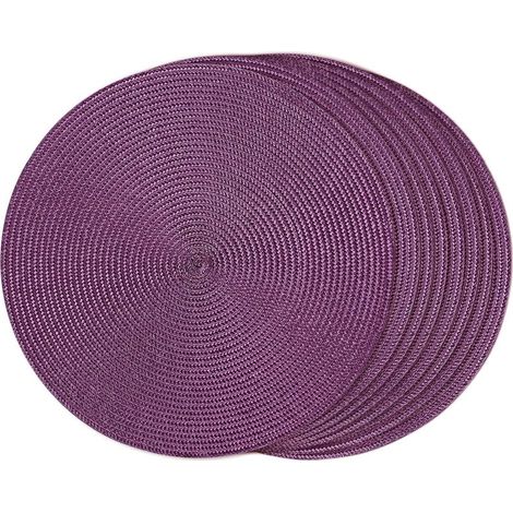 Huit sets de table ronds violets, fabriqués en polypropylène résistant aux hautes températures, pour protéger la table. (1/5)