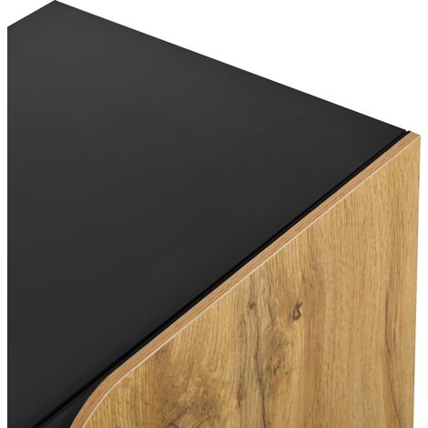 Ce meuble de rangement, doté d’une forme unique, est équipé de quatre portes, de compartiments réglables à l’intérieur, de pieds en métal noir et de portes incurvées. (1/5)