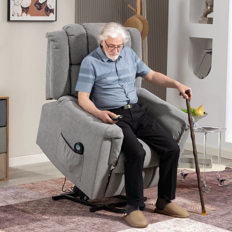 Fauteuil releveur électrique gris anthracite, inclinable avec fonctions massage et chaleur, repose-jambes motorisé pour un confort absolu. (1/5)