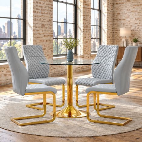 Conjunto de mesa de comedor redonda de cristal 85 cm con 4 sillas gris claro y oro DESVIAE (1/5)