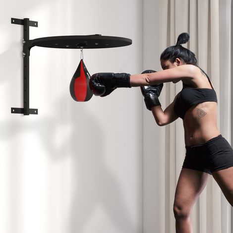 Plataforma mural con saco de velocidad y saco de boxeo para entrenamiento, altura regulable y giro de 360°.