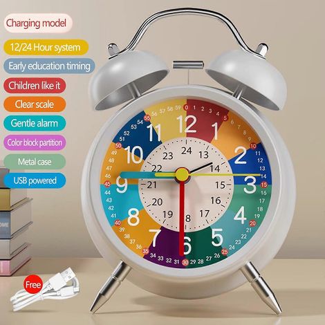 Ce réveil analogique possède un cadran coloré, un mécanisme silencieux, fonctionne sur piles et est rétroéclairé. Il est idéal pour les chambres d'enfants et d'adolescents, les aidant à apprendre à li (1/4)