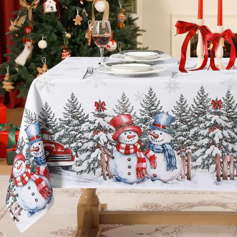 Mantel navideño rectangular blanco con un muñeco de nieve tradicional, copos de nieve y un árbol de Navidad, ideal para la sala de estar, fiestas o la cocina. (1/4)