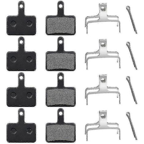 Quatre paires de plaquettes de frein de rechange pour vélo, compatibles avec les VTT et les vélos de route.