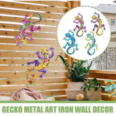 Farben: siehe Foto. Material: Eisen. Wanddekoration aus Metall mit einer farbenfrohen Eidechse.