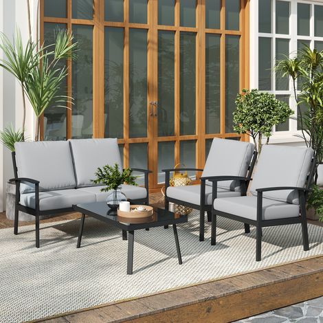 Ensemble de jardin 4 pièces comprenant 2 fauteuils, un canapé 2 places et une table basse. En aluminium et fibre de verre. Gris anthracite.