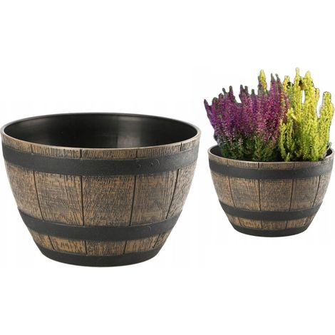 Maceta de imitación madera marrón oscuro de 40 cm con forma de barril.