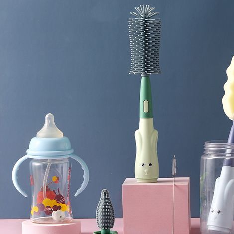 Brosse en silicone pour nettoyer les biberons, en forme de lapin, avec un long manche, sans emballage, verte. (1/5)