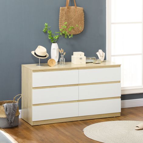 Commode moderne en bois à 6 tiroirs. Dimensions : 135 x 48 x 77 cm. Idéale pour la chambre. Blanche et en bois.
