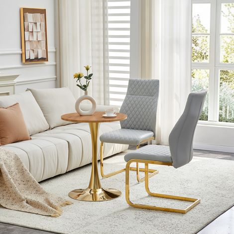 Set da pranzo con tavolo rotondo in MDF effetto legno 60x72 cm e 2 sedie in PU grigio chiaro, struttura in metallo oro (1/5)