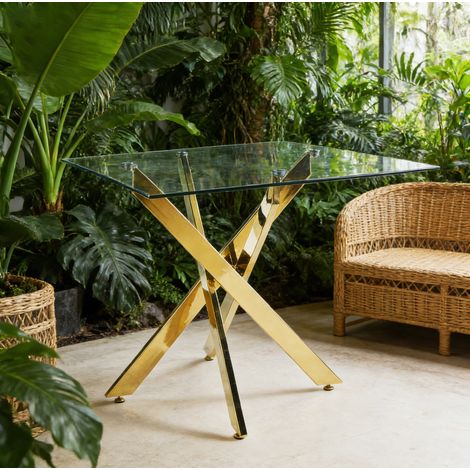 Mesa de comedor 80x80x75 cm dorada en vidrio y metal con patas cruzadas, estable y fácil de limpiar (1/5)