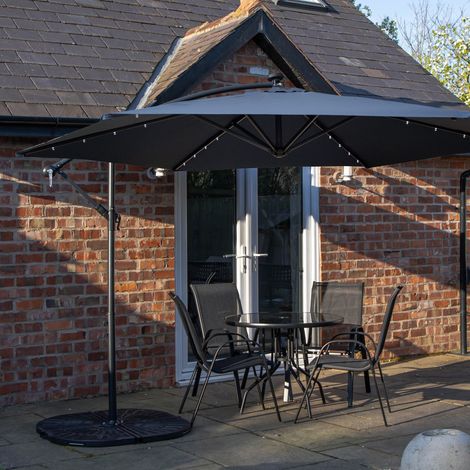 Outdoor 4 Person Round Glass Top Garden Dining Table Chairs With Blue Banana Lit Parasol and Base (1/5)