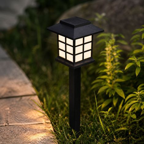 Lampada solare da giardino per esterni, impermeabile IP44, con illuminazione LED automatica a luce calda/bianca/RGB, robusta struttura in ABS per prato e patio. (1/4)