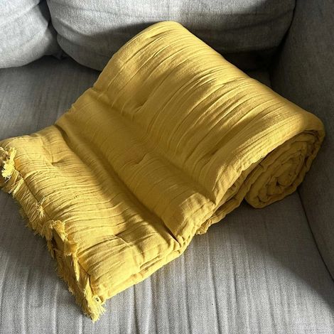 Edredon gaze de coton / coton coloris jaune orangé garni 80 x