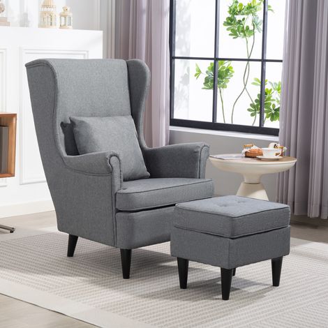 Sillón reclinable con reposapiés tipo puf, cojín y respaldo alto, sillón acolchado para dormitorio con patas y reposabrazos de madera para sala de estar y salón, 75x83x104 cm, gris. (1/5)