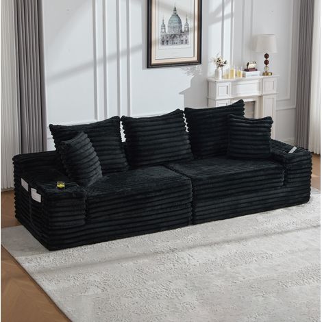Sofá cama 273x98x87 cm negro de pana con respaldo alto, cojines, bolsillos laterales y portavasos (1/5)